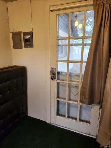 a view of a backyard with wooden floor