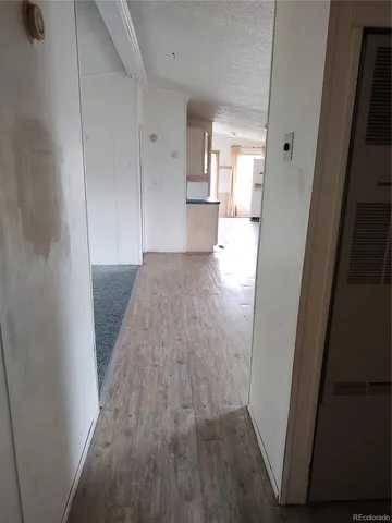 a view of a room with a rug