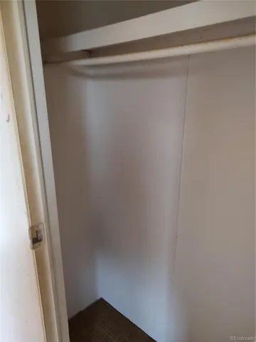 a bathroom with a toilet and a bathtub