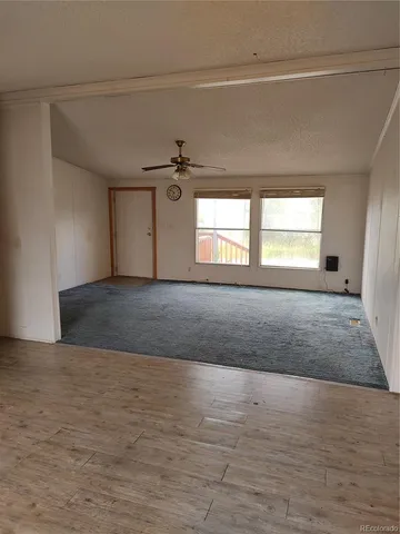 a view of a livingroom with a flat screen tv