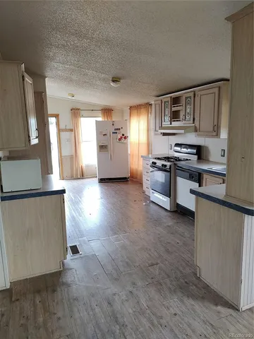 a view of an empty room and closet