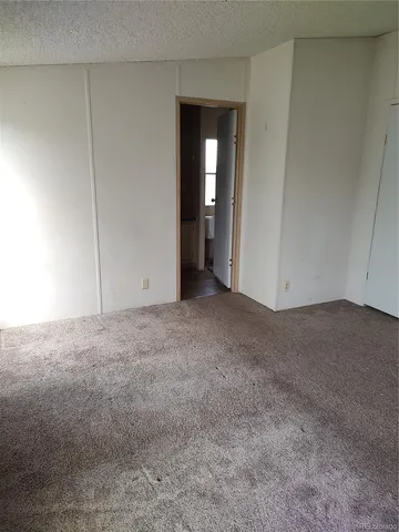 a bath tub sitting in a bathroom next to a sink