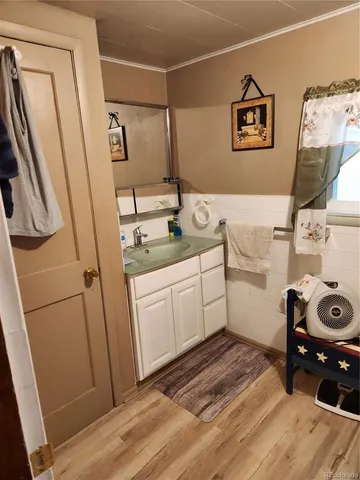 a bathroom with a toilet and a sink
