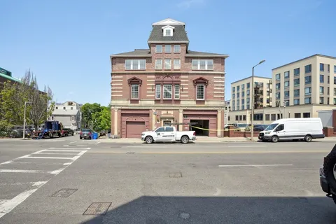 a front view of a building with street