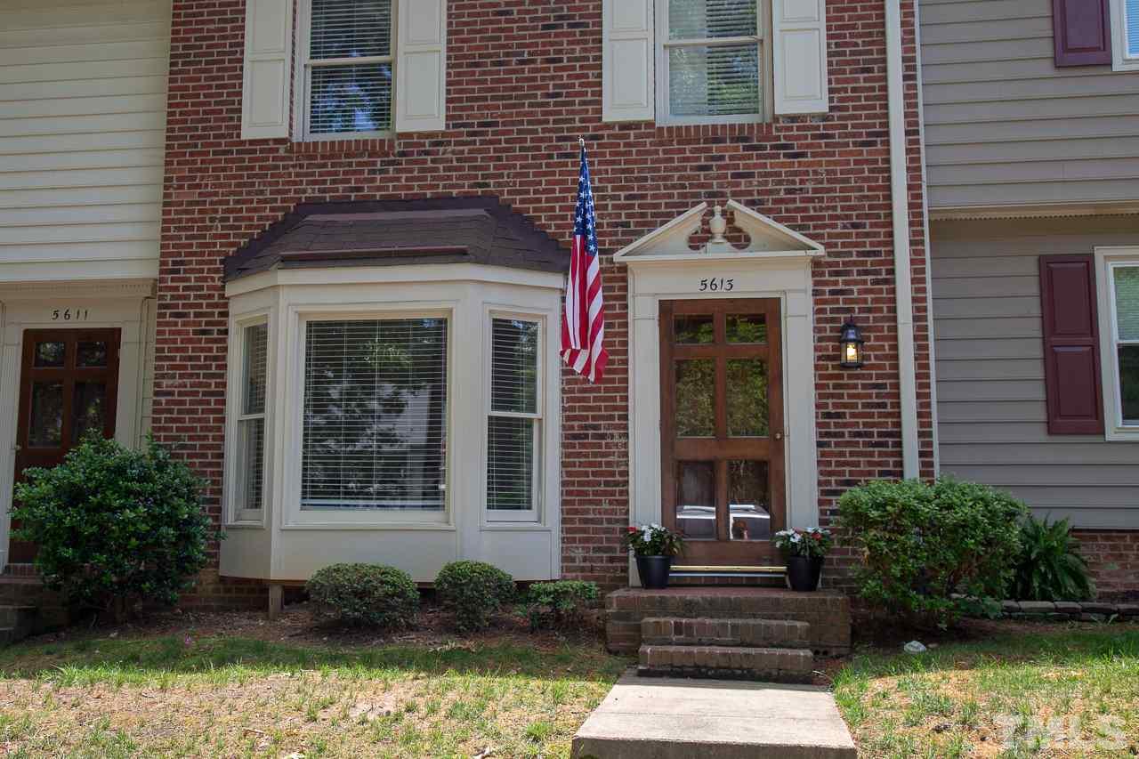 5613 Hamstead Crossing Raleigh, NC 27612 - Photo 1 of 20 a front view of a house with plants