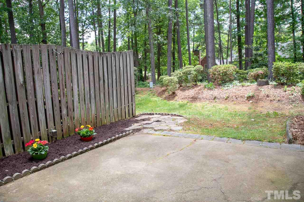 5613 Hamstead Crossing Raleigh, NC 27612 - Photo 18 of 20 a view of a backyard with garden