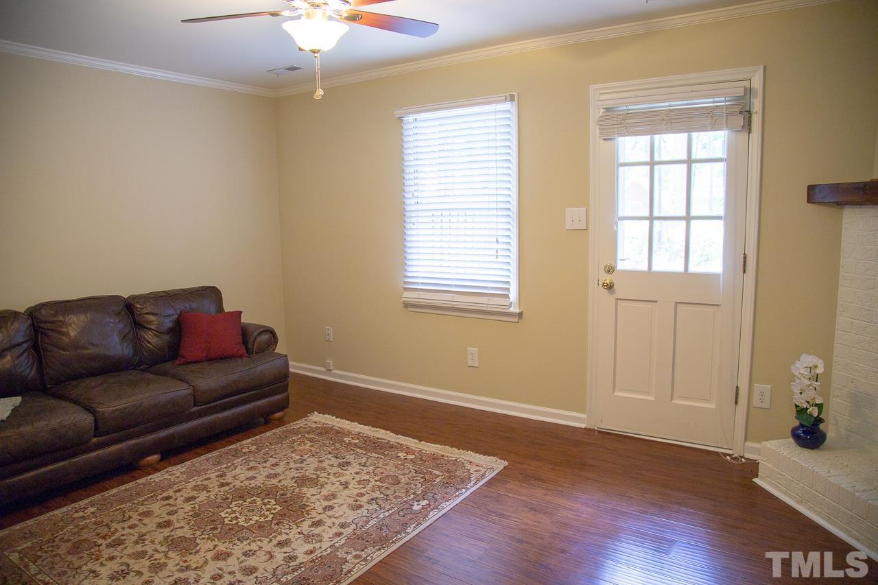 5613 Hamstead Crossing Raleigh, NC 27612 - Photo 6 of 20 a living room with furniture and a window