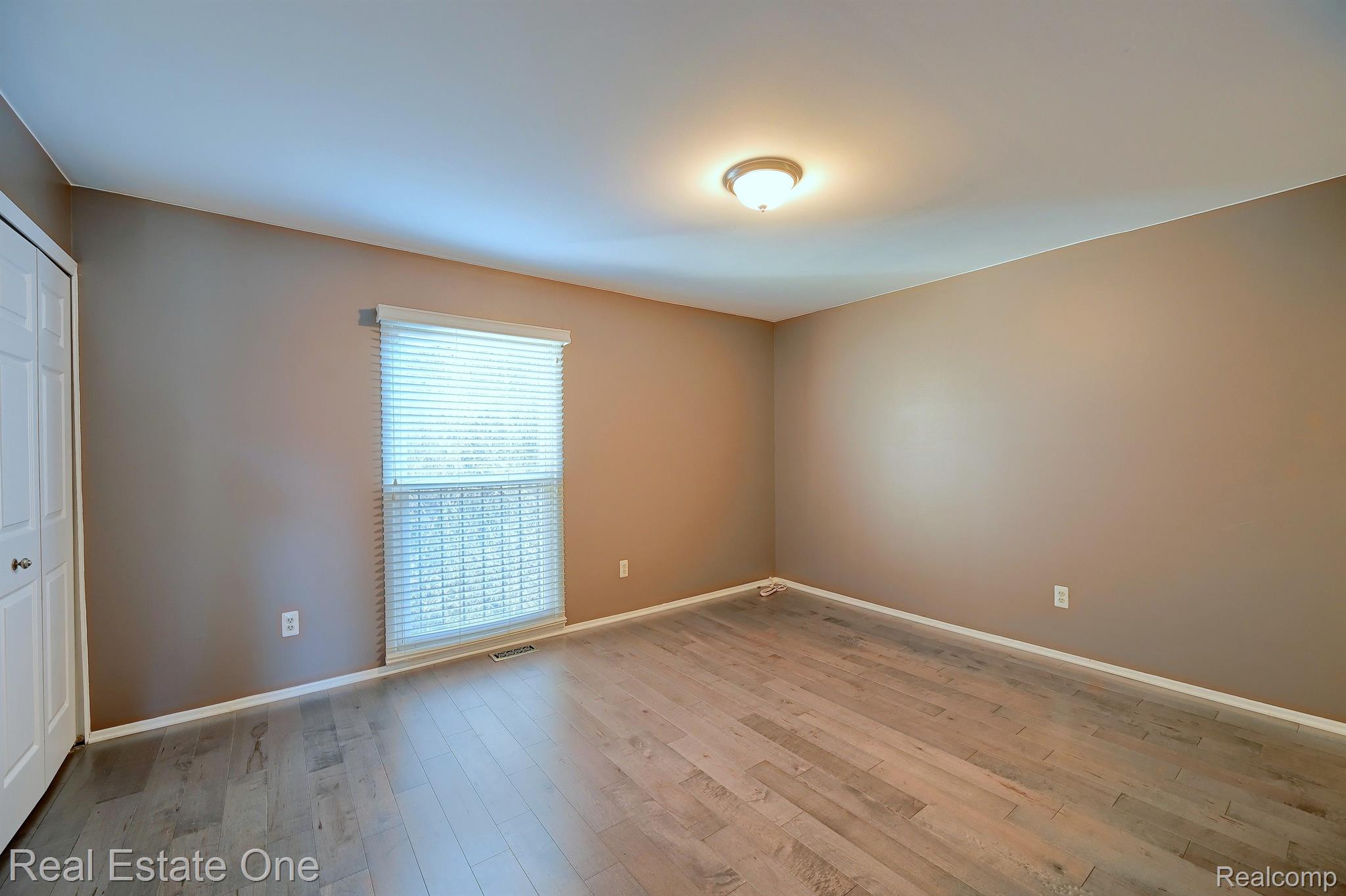 1372 Crescent Lane, Unit 301 Rochester, MI 48306 - Photo 15 of 41 Priimary Bedroom - Engineered Hardwood Floors