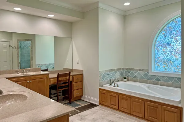 a view of a bathroom from a hallway