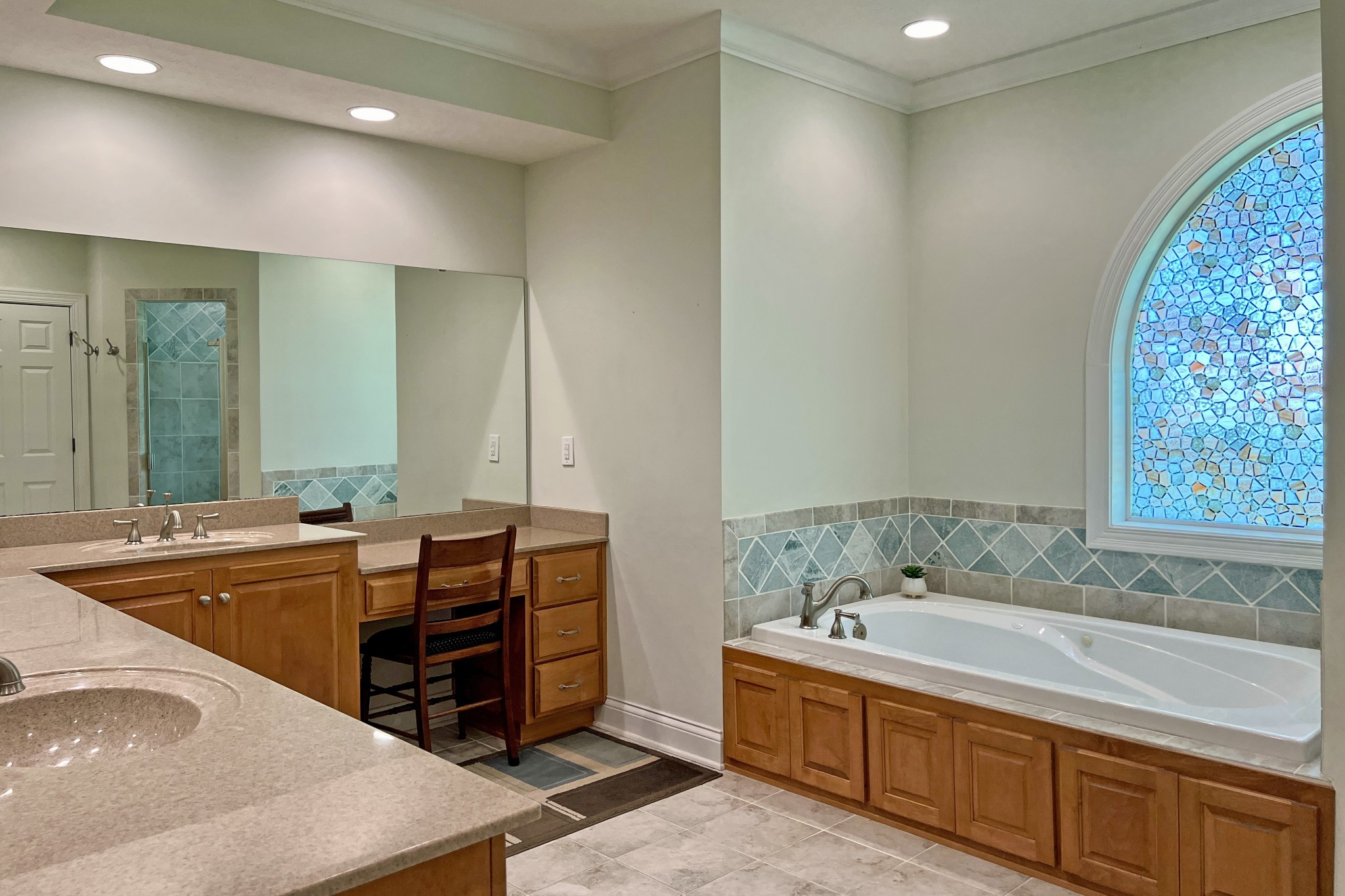 1371 Johns Loop Road Franklin, KY 42134 - Photo 30 of 72 a spacious bathroom with a tub double sink and mirror
