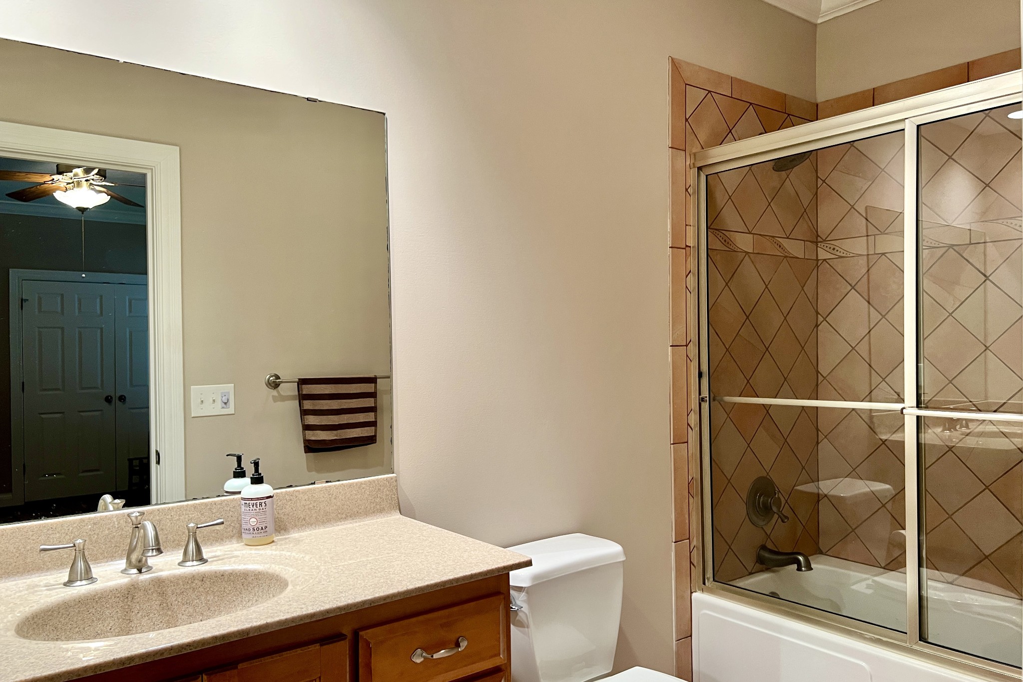 1371 Johns Loop Road Franklin, KY 42134 - Photo 46 of 72 a bathroom with a sink toilet and shower