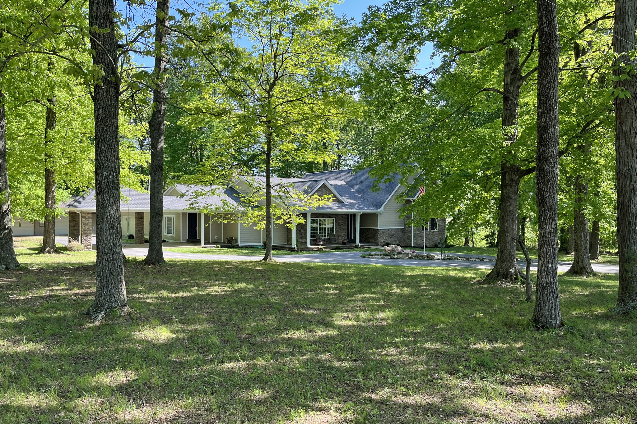 1371 Johns Loop Road Franklin, KY 42134 - Photo 51 of 72 a front view of a house with a garden