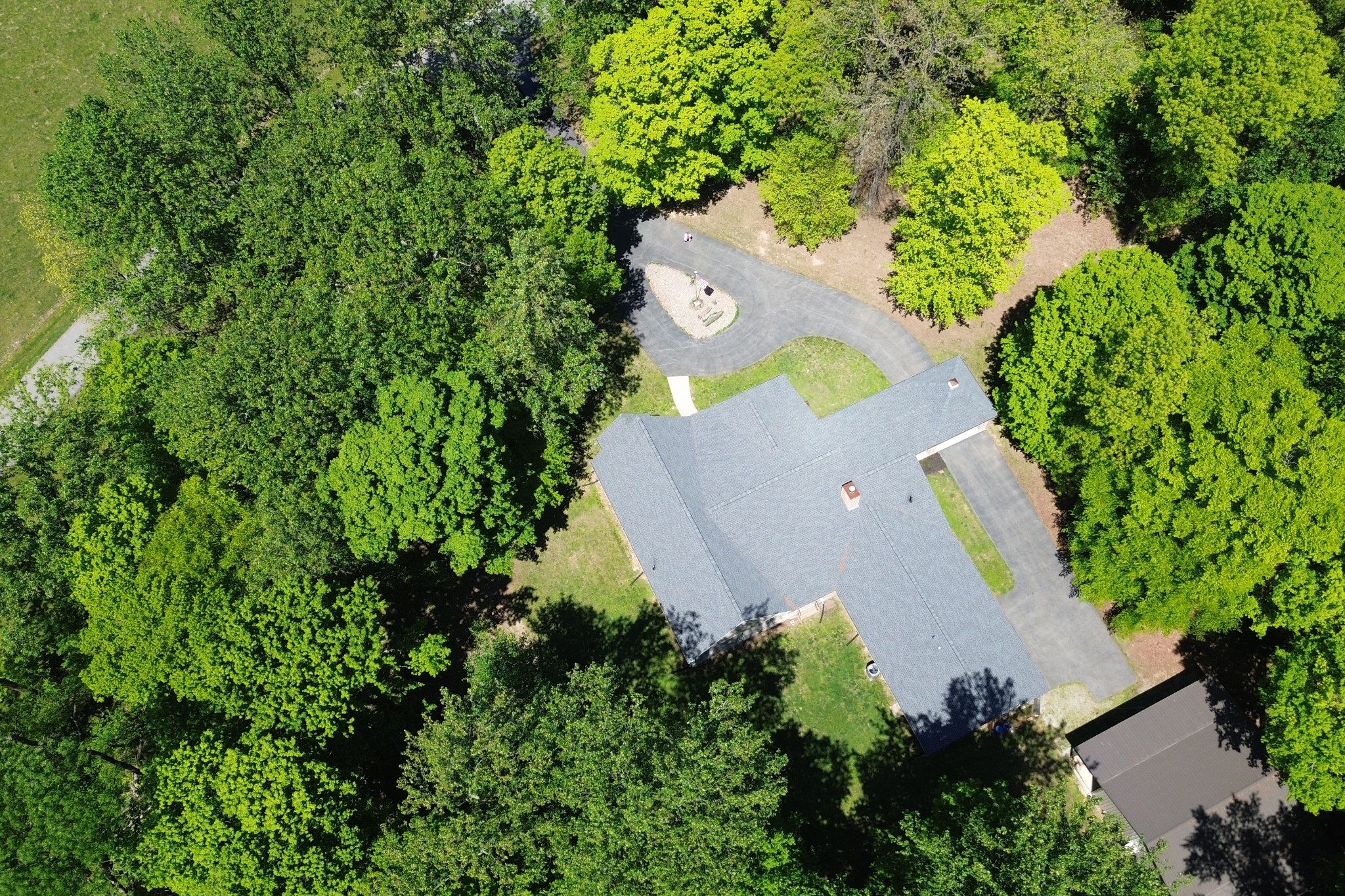 1371 Johns Loop Road Franklin, KY 42134 - Photo 58 of 72 an aerial view of a house with a yard and garden