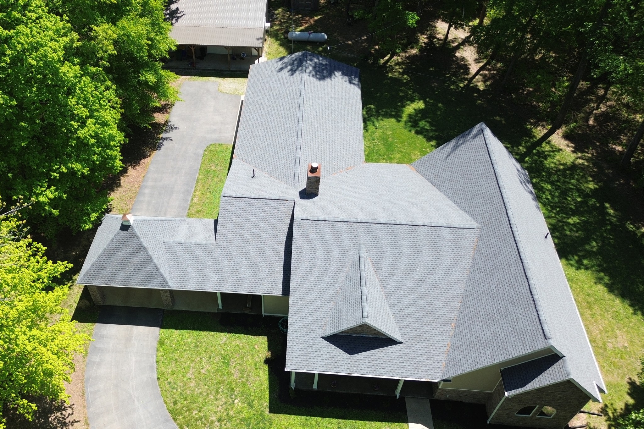 1371 Johns Loop Road Franklin, KY 42134 - Photo 59 of 72 an aerial view of a house with swimming pool and large trees