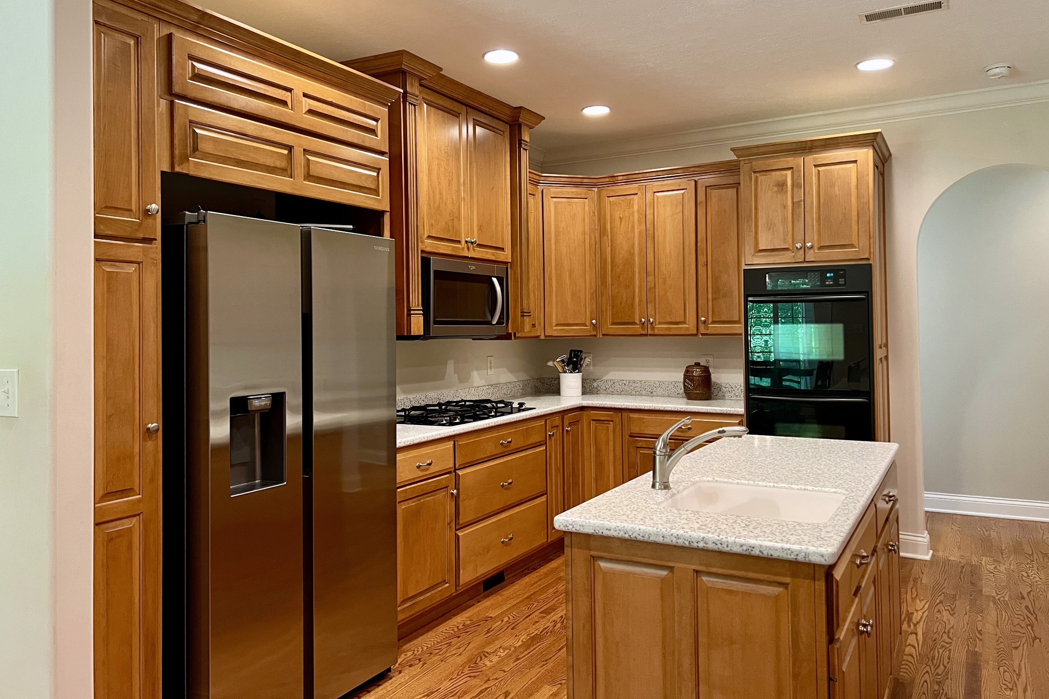 1371 Johns Loop Road Franklin, KY 42134 - Photo 10 of 72 a kitchen with stainless steel appliances granite countertop a refrigerator a stove and a sink