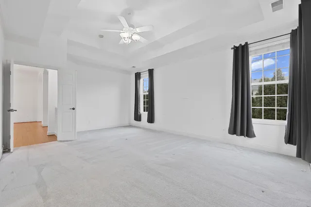 a bathroom with a sink vanity and a mirror