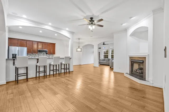 a view of kitchen with furniture and wooden floor