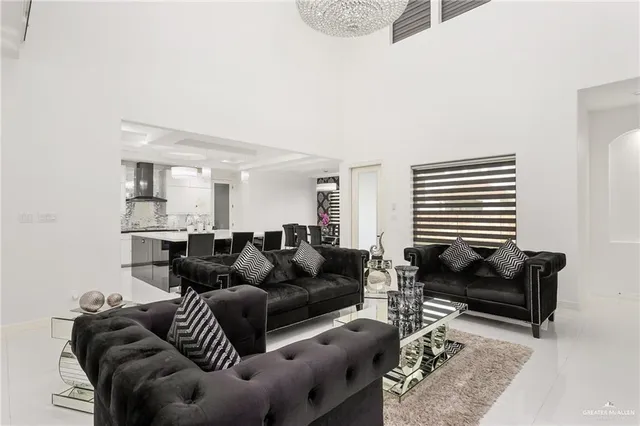 a kitchen with a sink a counter top stainless steel appliances and cabinets