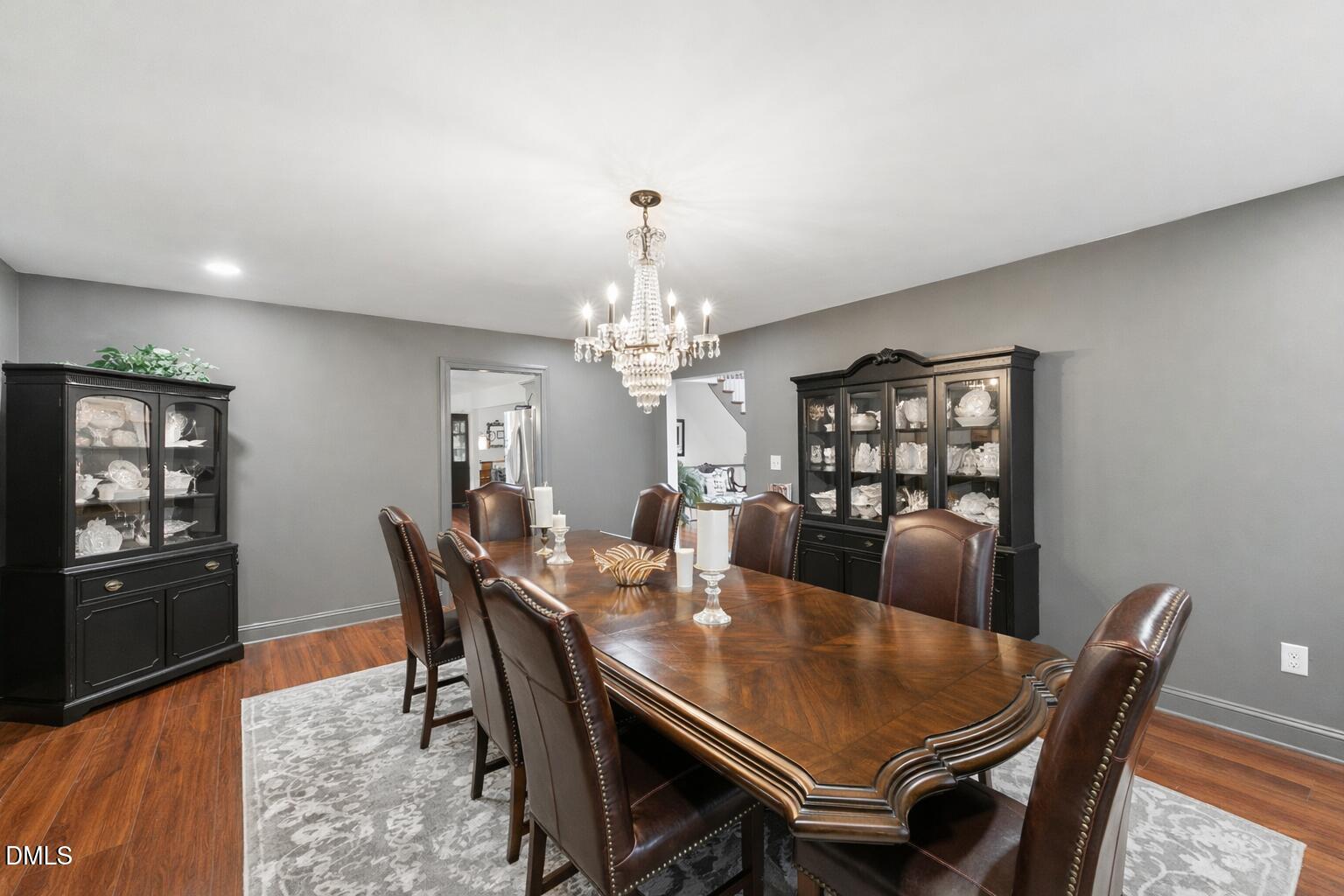 474 East Barefoot Road Newton Grove, NC 28366 - Photo 15 of 63 a view of a dining room with furniture and wooden floor