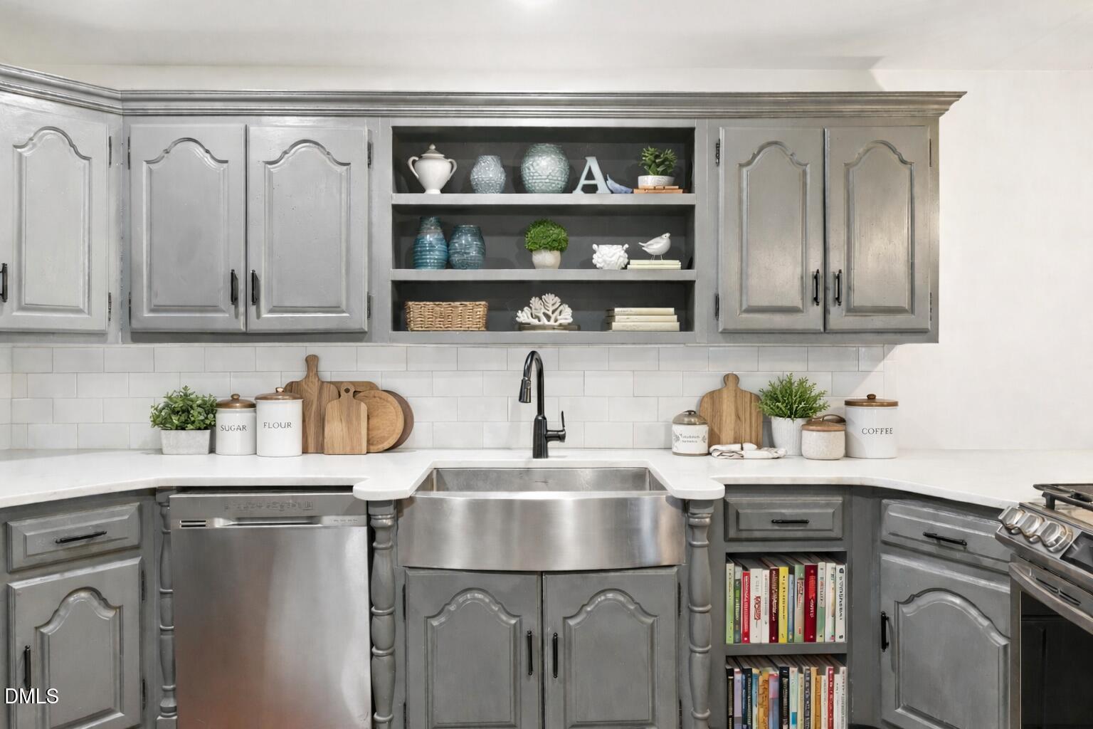 474 East Barefoot Road Newton Grove, NC 28366 - Photo 17 of 63 a kitchen with a refrigerator and a sink