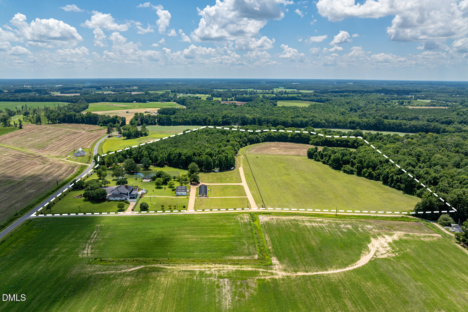 474 East Barefoot Road Newton Grove, NC 28366 - Photo 58 of 63 an aerial view of a house with a garden and lake view