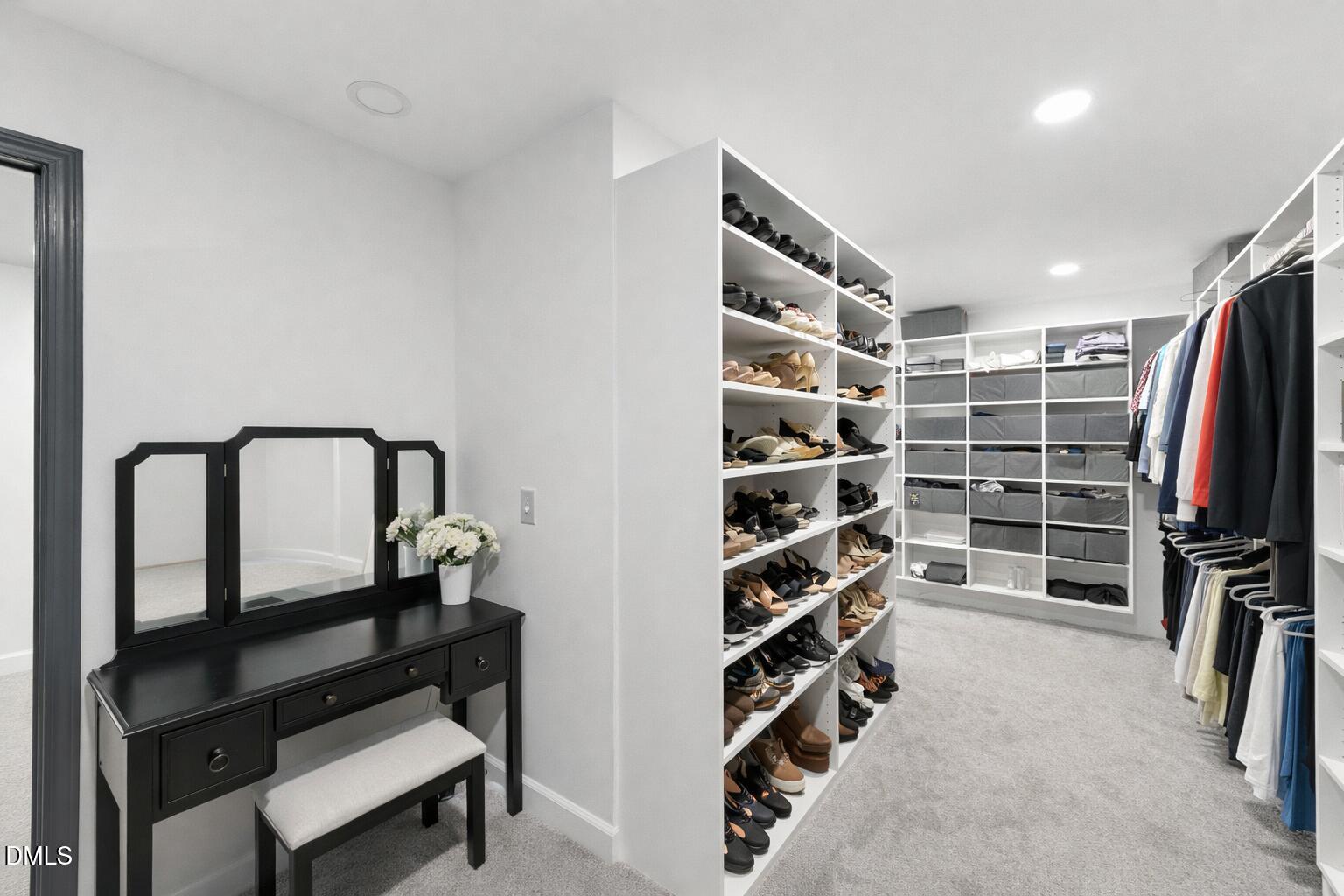 474 East Barefoot Road Newton Grove, NC 28366 - Photo 59 of 63 a view of walk in closet with clothes and shoes