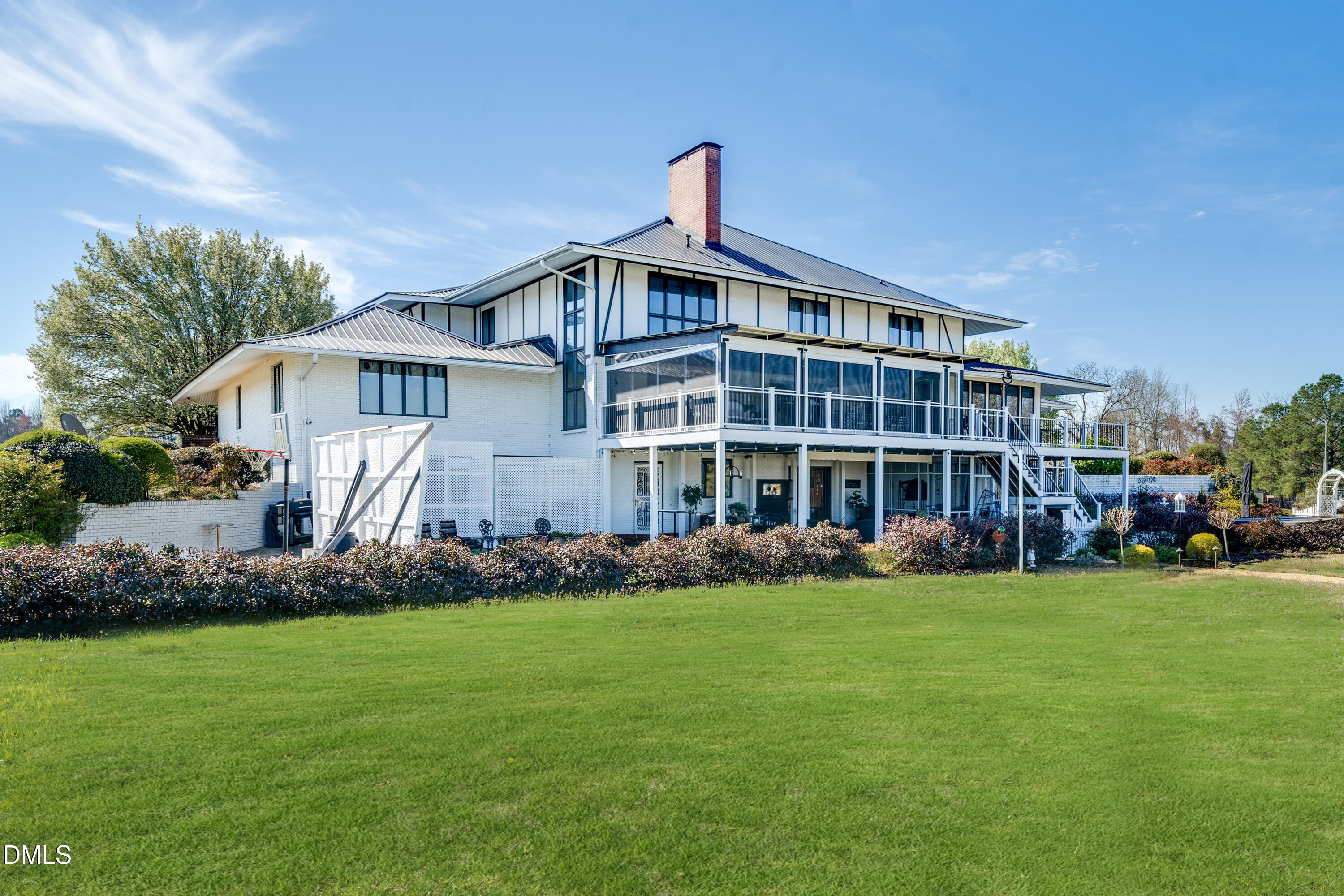 474 East Barefoot Road Newton Grove, NC 28366 - Photo 5 of 63 a front view of a house with a garden