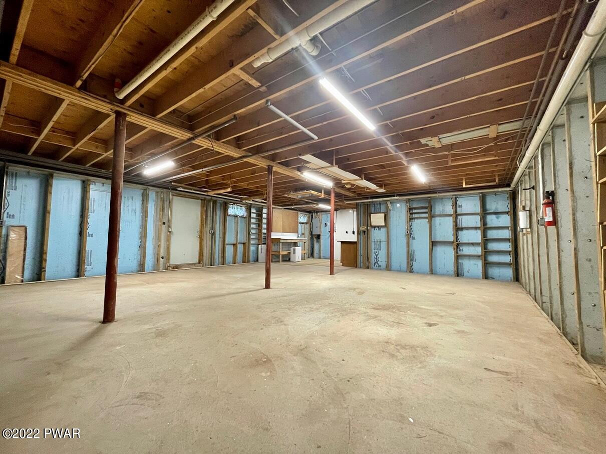 524 Creamton Drive Prompton, PA 18456 - Photo 51 of 57 a view of an empty room with a garage