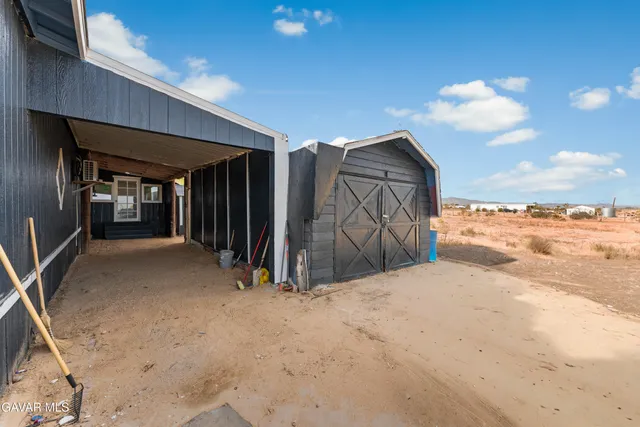 a view of a storage & utility room with wooden floor