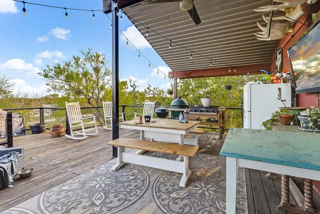 a view of a chairs and tables in the patio