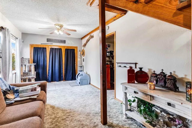 a view of a living room and dining room