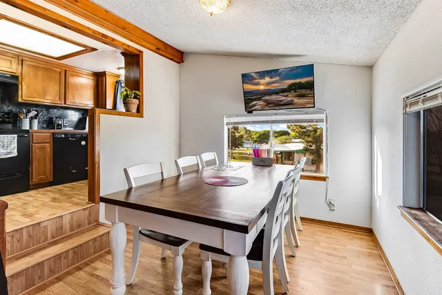 a view of a dining room with furniture
