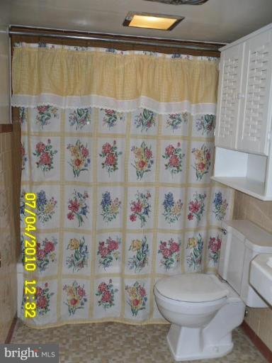 8003 Haas Lane Rosedale, MD 21237 - Photo 11 of 18 LL full bath ceramic tile floor