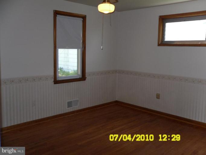 8003 Haas Lane Rosedale, MD 21237 - Photo 5 of 18 BR2 w beautiful hardwd floors, nice closet,windows