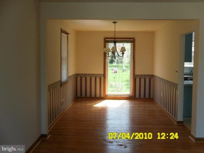 8003 Haas Lane Rosedale, MD 21237 - Photo 7 of 18 Stunning full window beveled glass and hdwd flrs.
