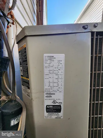 a view of a livingroom with a ceiling fan and window