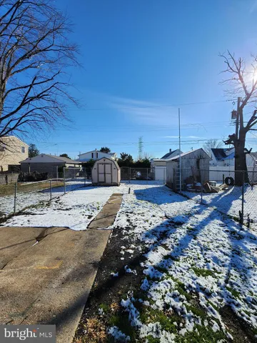 a view of an empty room and wooden floor