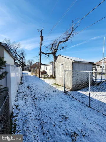 a view of a room with air conditioner duct and windows