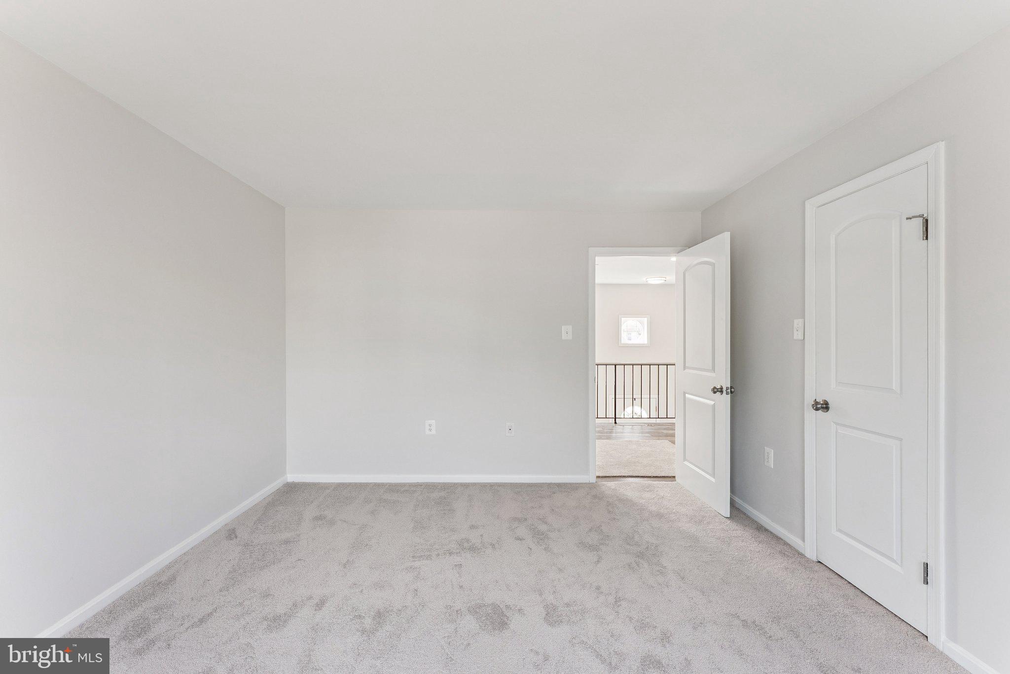 7408 Emerald Drive Manassas, VA 20109 - Photo 19 of 44 a view of an empty room and window