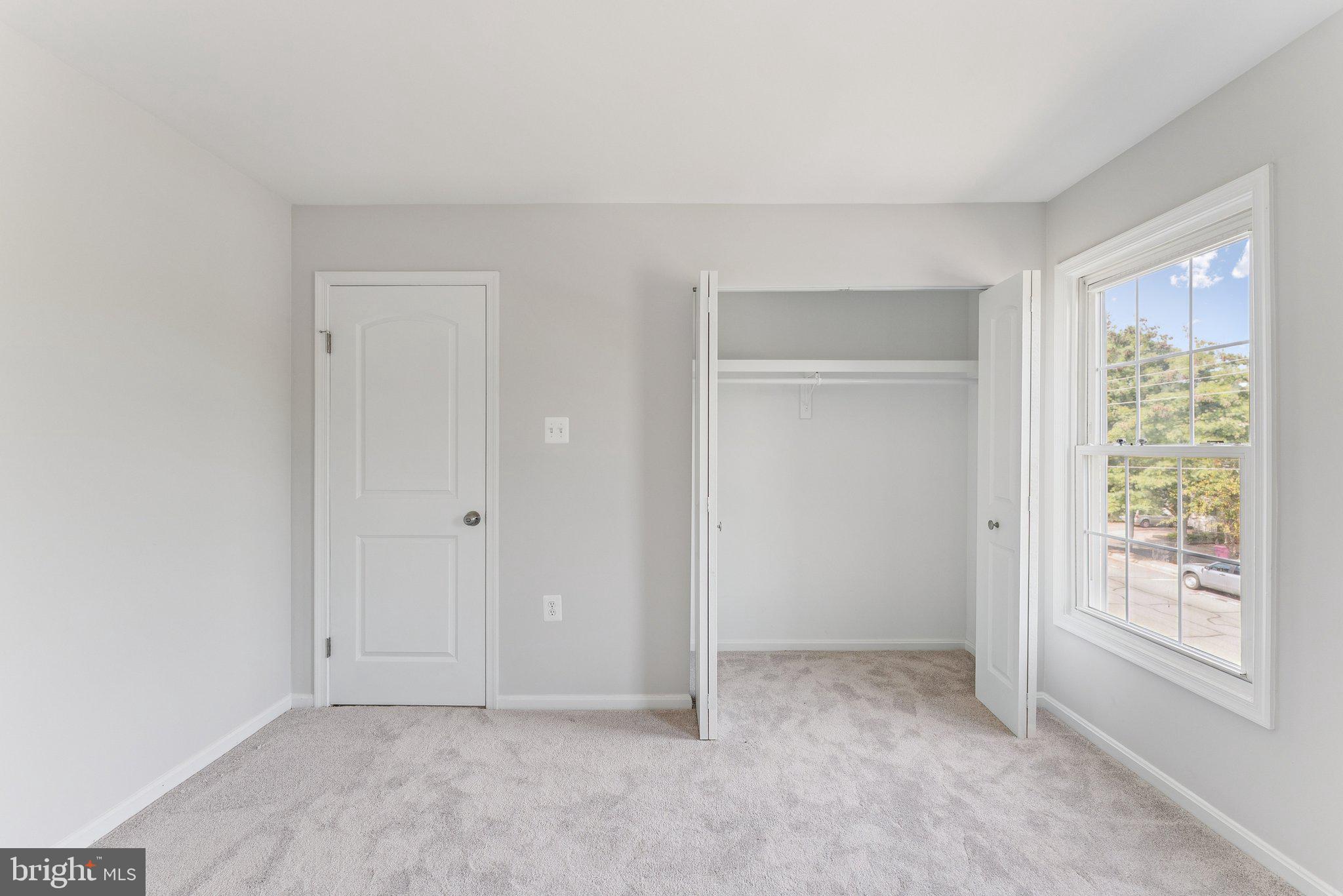 7408 Emerald Drive Manassas, VA 20109 - Photo 23 of 44 a view of an empty room with a window