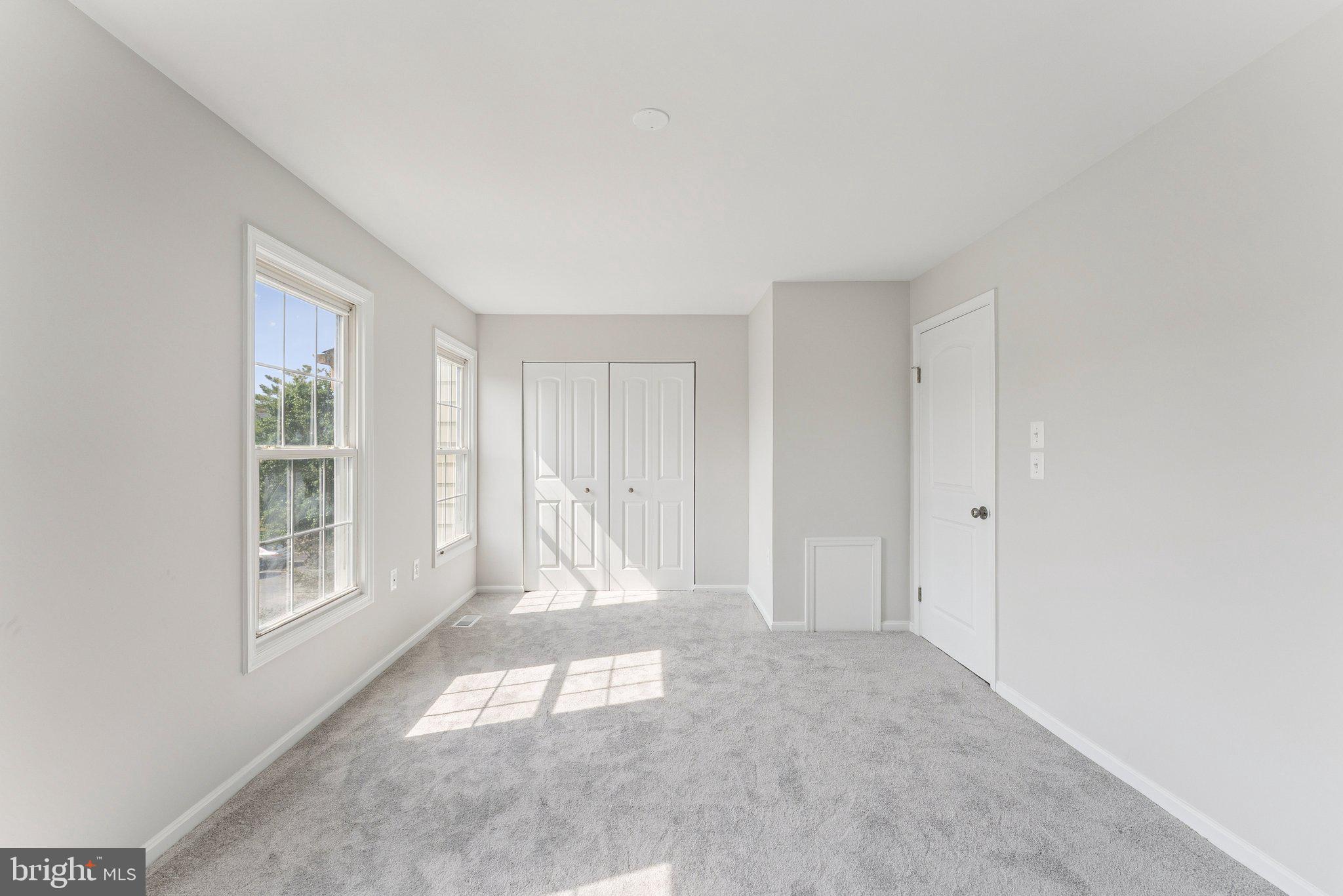 7408 Emerald Drive Manassas, VA 20109 - Photo 30 of 44 a view of an empty room and window