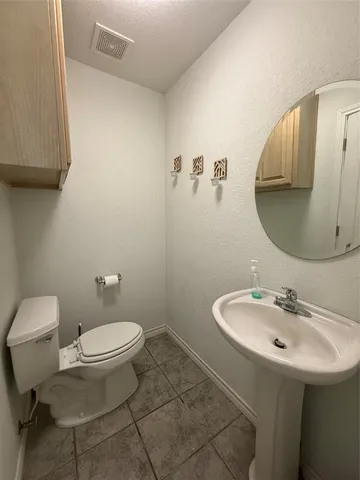 a view of bedroom with furniture and staircase