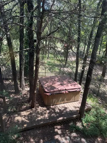 a view of outdoor space with trees all around