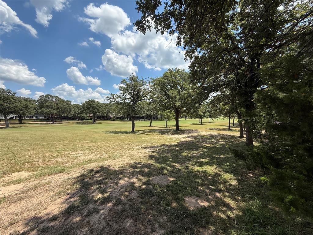 104 Pawnee Trail Gainesville, TX 76240 - Photo 28 of 30 a view of lake with tree