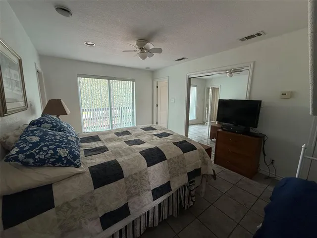 a bathroom with a toilet a sink and a shower