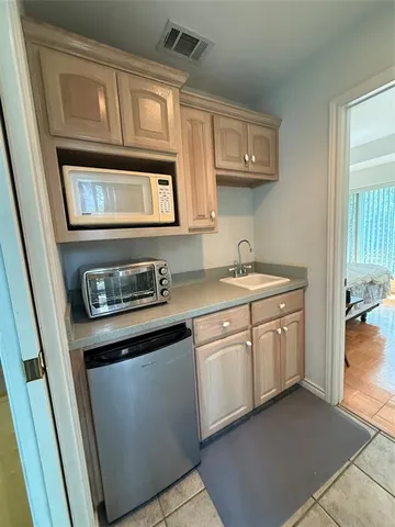 a view of an entryway with a workspace