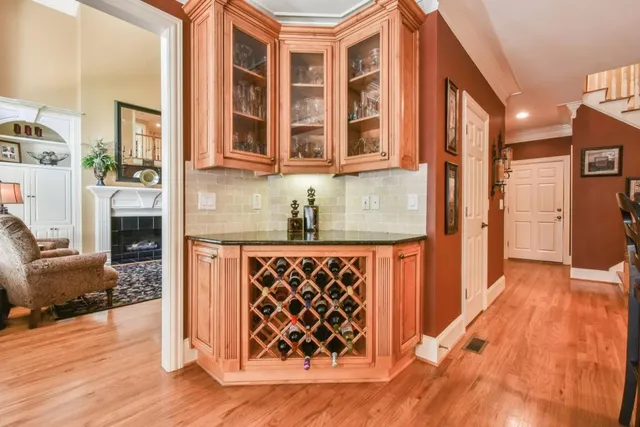 a view of a bathroom with a sink and a mirror