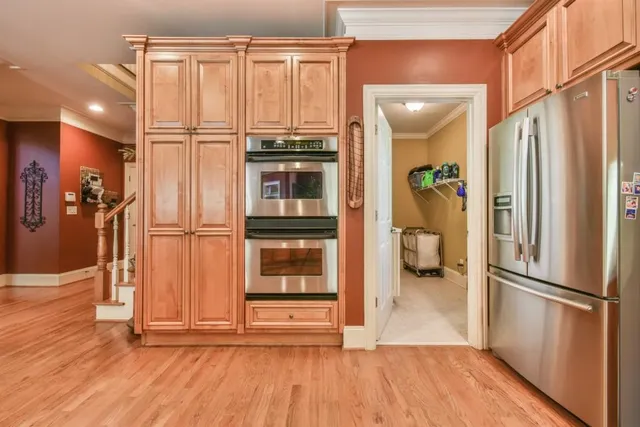 a view of a hallway with a livingroom and a hallway
