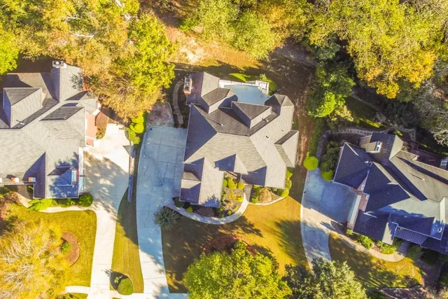 a view of a building with potted plants