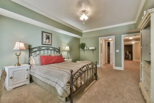 a view of a brick house with large windows